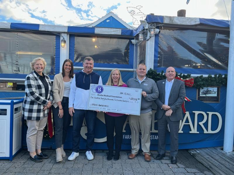 Beebe Medical Foundation check presentation attendees shown are (l-r) Kay Young, foundation executive director of development; Taylor Modica, The Starboard private event coordinator; Steve Montgomery, The Starboard owner; Amy Keller, foundation event coordinator; Justen Albright, foundation financial analyst; and Tom Protack, foundation president. SUBMITTED PHOTO
